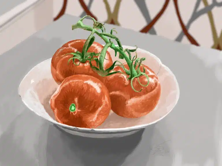 Cluster of ripe red tomatoes with green vine stems in a white bowl on a gray surface, close-up view.